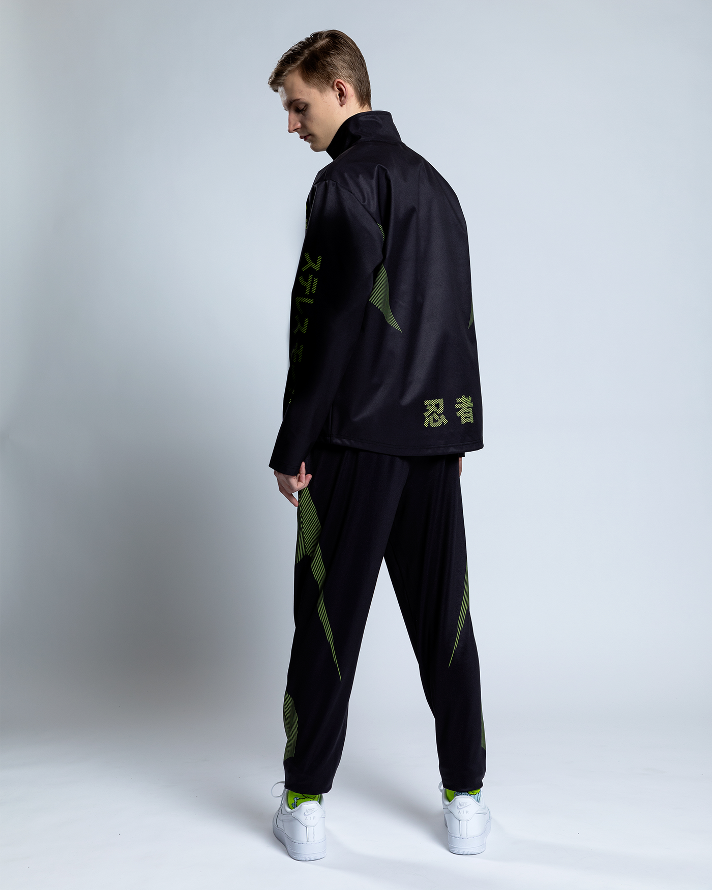 Shinobi Shozoku Jacket, a high-quality product from the Ninjas in Pyjamas merch shop. This stylish and versatile jacket features the iconic Shinobi Shozoku design, making it the perfect choice for NIP fans who want to express their support for the team in a fashionable and functional way.