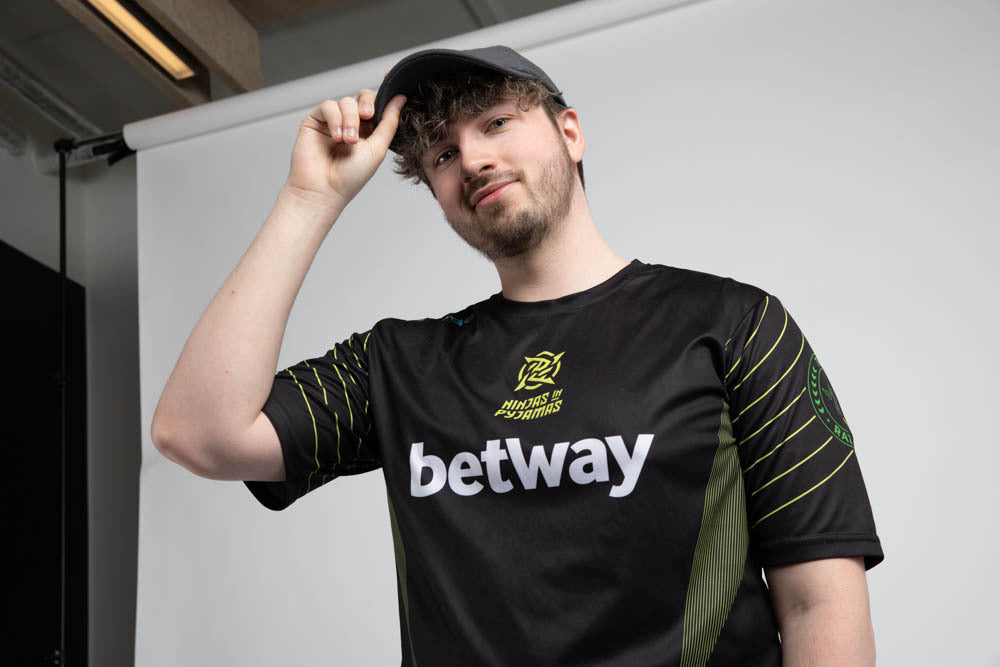 A graphite ninja cap from the NIP X Stiksen merch collaboration, featuring the Ninjas in Pyjamas nickname subtly embroidered on the front. This stylish and adjustable cap is perfect for showcasing your support for NIP in a sleek and trendy way.