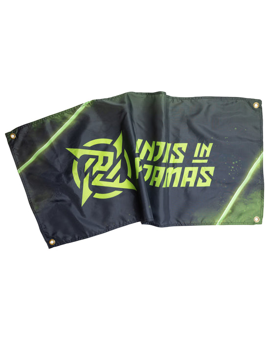 A high-quality flag featuring the iconic Ninjas in Pyjamas logo in bold colors on a black background. This premium flag is made of durable material and is perfect for proudly displaying your support for NIP.