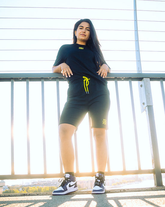 Lagom Collection - Black Shorts from Ninjas in Pyjamas Shop. A pair of black shorts from the Lagom Merch Collection, featuring the subtle Ninjas in Pyjamas logo on the side. These comfortable and stylish shorts are perfect for casual wear or as activewear, allowing you to showcase your support for NIP and esports in ultimate comfort and style.