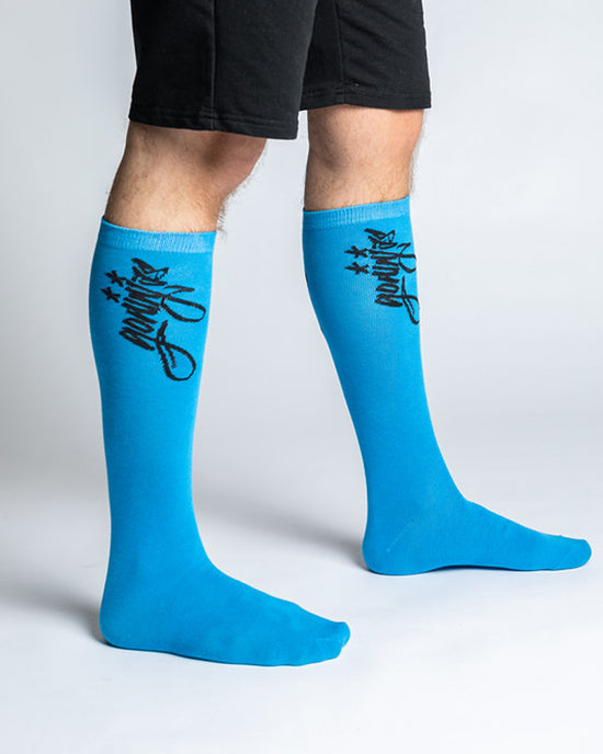 A pair of classic blue socks with the Ninjas in Pyjamas logo from NIP merch collection. These comfortable and stylish socks are designed to represent your passion for NIP and esports while adding a touch of ninja-inspired flair to your everyday outfit.