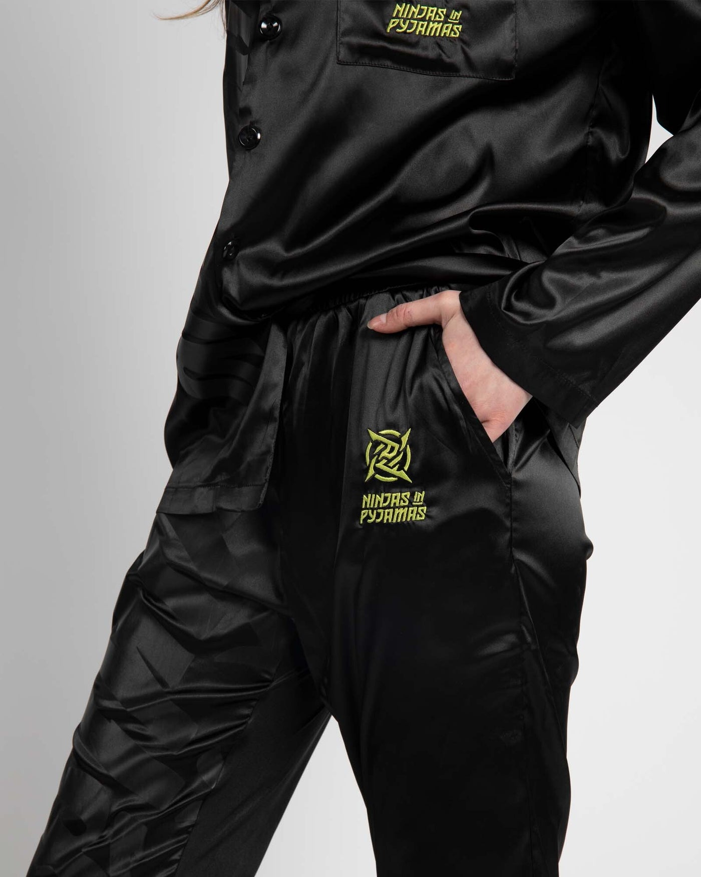 Ninjutsu Collection - Pyjamas from Ninjas in Pyjamas Shop. Ninjutsu Merch Collection's pyjamas, featuring the iconic Ninjas in Pyjamas logo on the comfortable sleepwear set. These stylish and cozy pyjamas are perfect for expressing your passion for NIP while staying comfortable and relaxed during downtime or bedtime.