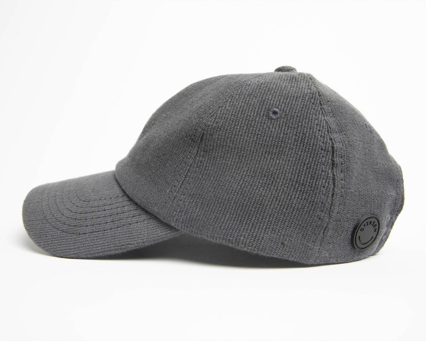 A graphite ninja cap from the NIP X Stiksen merch collaboration, featuring the Ninjas in Pyjamas nickname subtly embroidered on the front. This stylish and adjustable cap is perfect for showcasing your support for NIP in a sleek and trendy way.