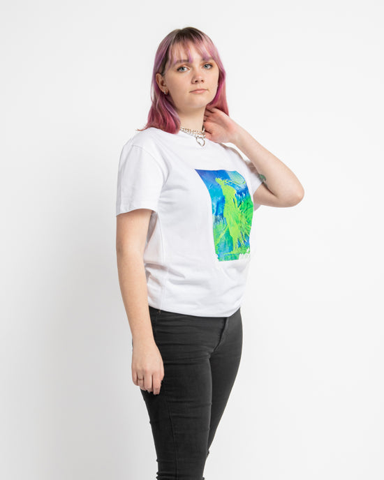 Ninjutsu Collection - White T-Shirt from Ninjas in Pyjamas Shop. A white t-shirt from the Ninjutsu Merch Collection, with the Ninjas in Pyjamas logo subtly printed on the front. This vibrant and trendy t-shirt is perfect for making a bold statement and showcasing your support for the NIP in a stylish and eye-catching way.