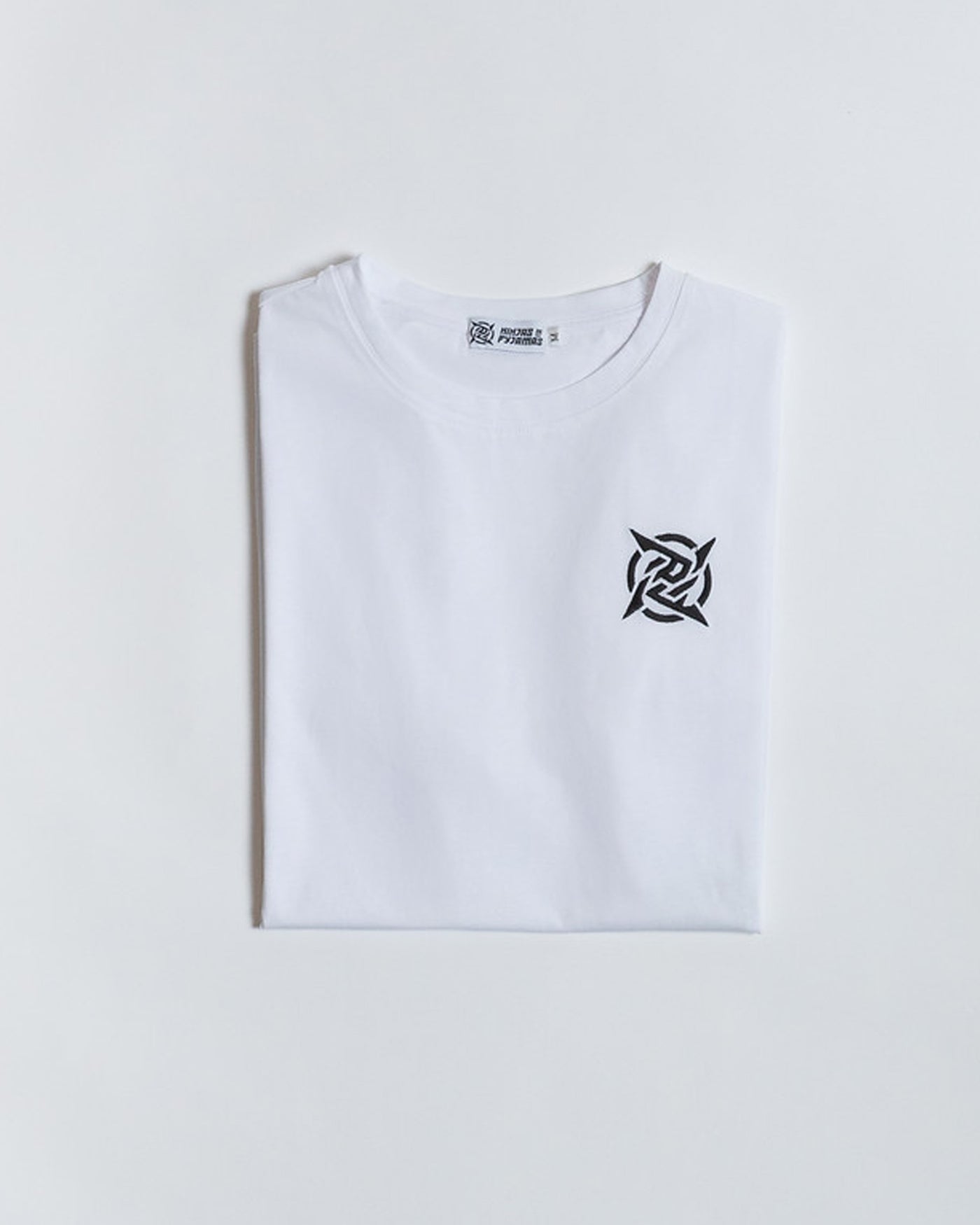 Lagom Collection - White T-shirt from Ninjas in Pyjamas Shop. An image displaying a white t-shirt from the Lagom Collection, featuring the Ninjas in Pyjamas logo subtly printed on the chest. This versatile and trendy t-shirt is a wardrobe essential, allowing you to express your passion for esports and NIP in a sleek and comfortable manner.