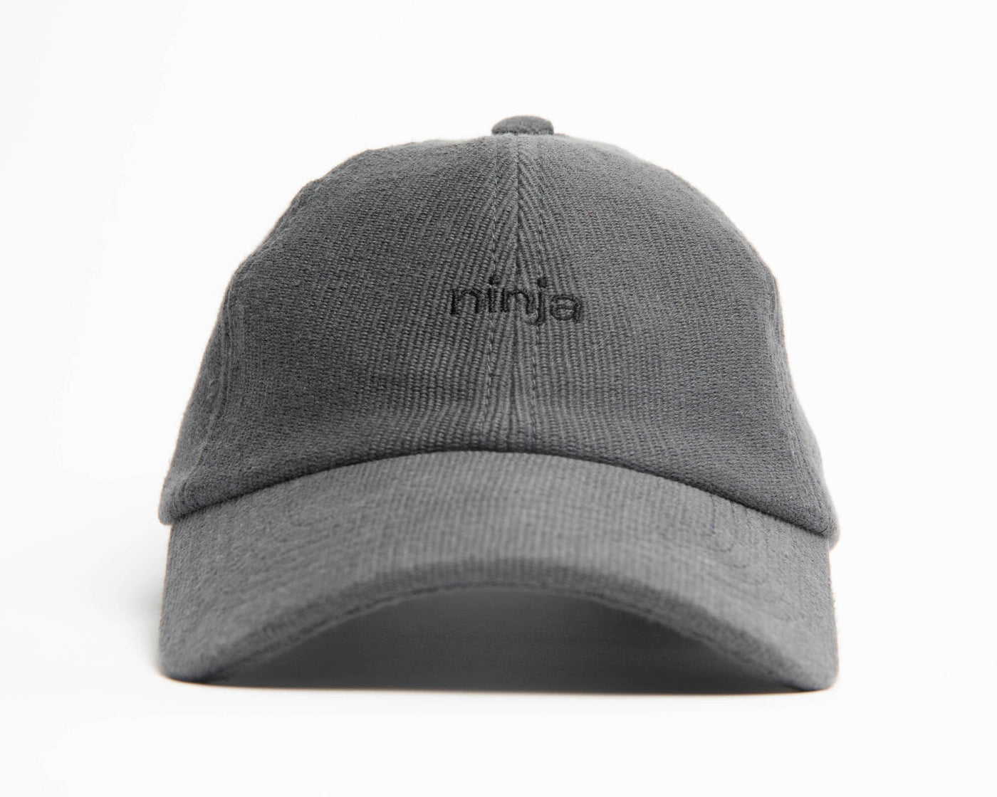 A graphite ninja cap from the NIP X Stiksen merch collaboration, featuring the Ninjas in Pyjamas nickname subtly embroidered on the front. This stylish and adjustable cap is perfect for showcasing your support for NIP in a sleek and trendy way.